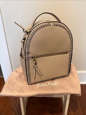 dooney and bourke leather backpack purse & Blue Pebble Footstool (Beauty and the Comfort Carrier Deuter Backpack related_to_Z149191 Colour:Mustard